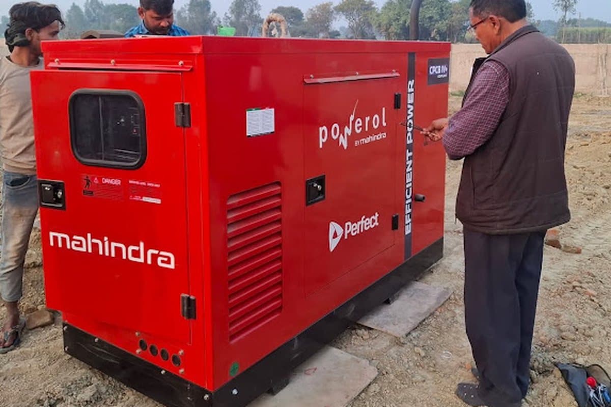 The installer's team with the unit during handover
